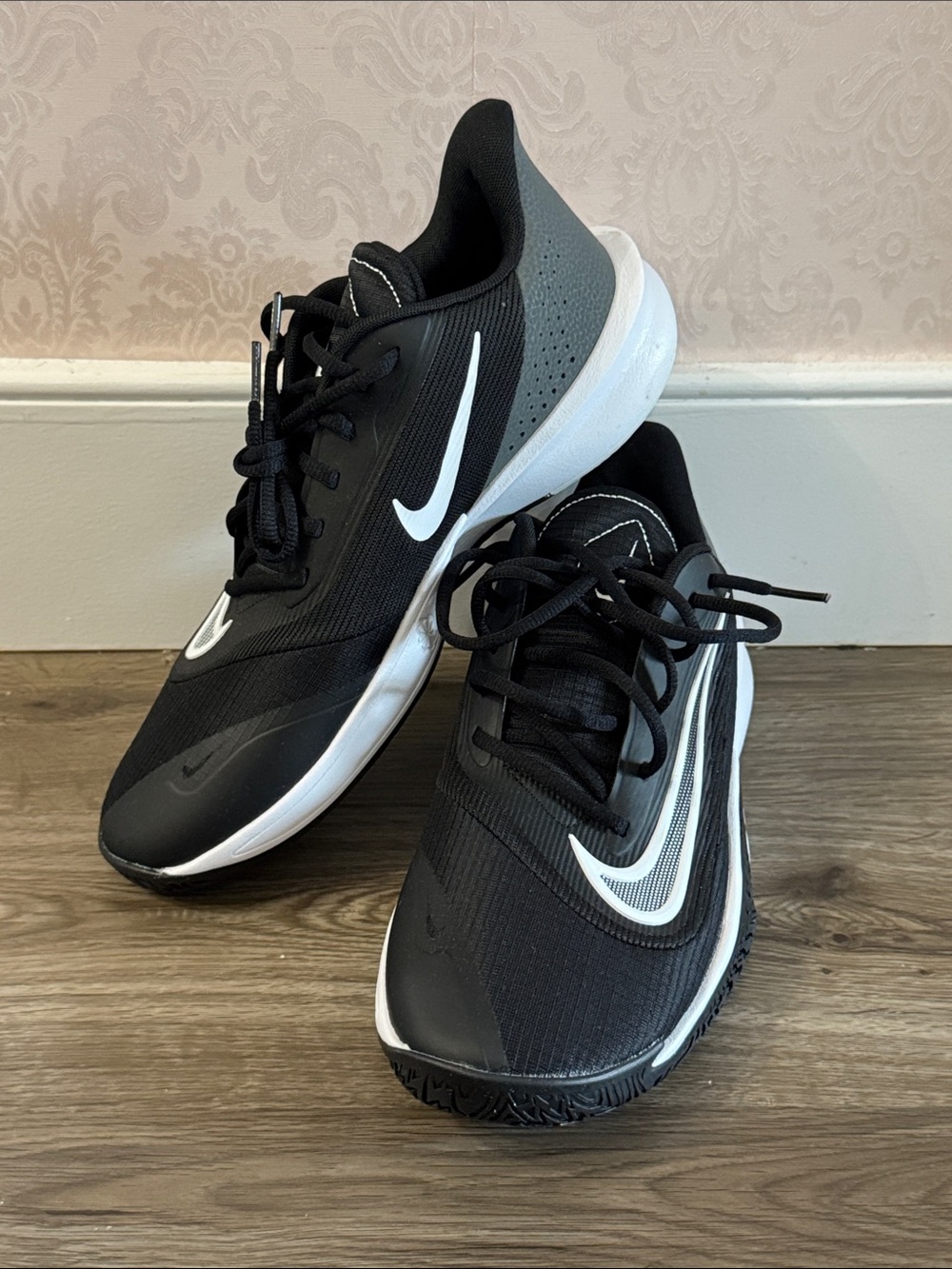 Nike Black and Gray Athletic Trainers with White Swoosh
